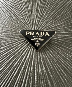 Prada metal brooch